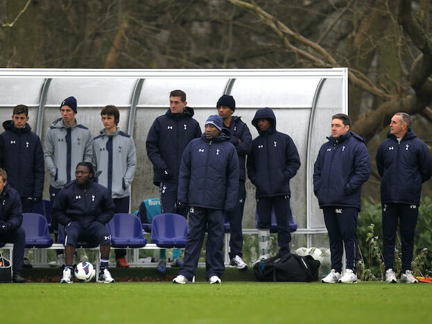 scouts_looking_over_pitch_on_the_sideline