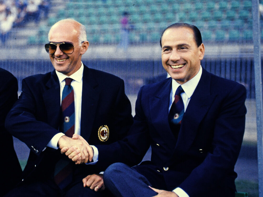 berlusconi_shaking_hands