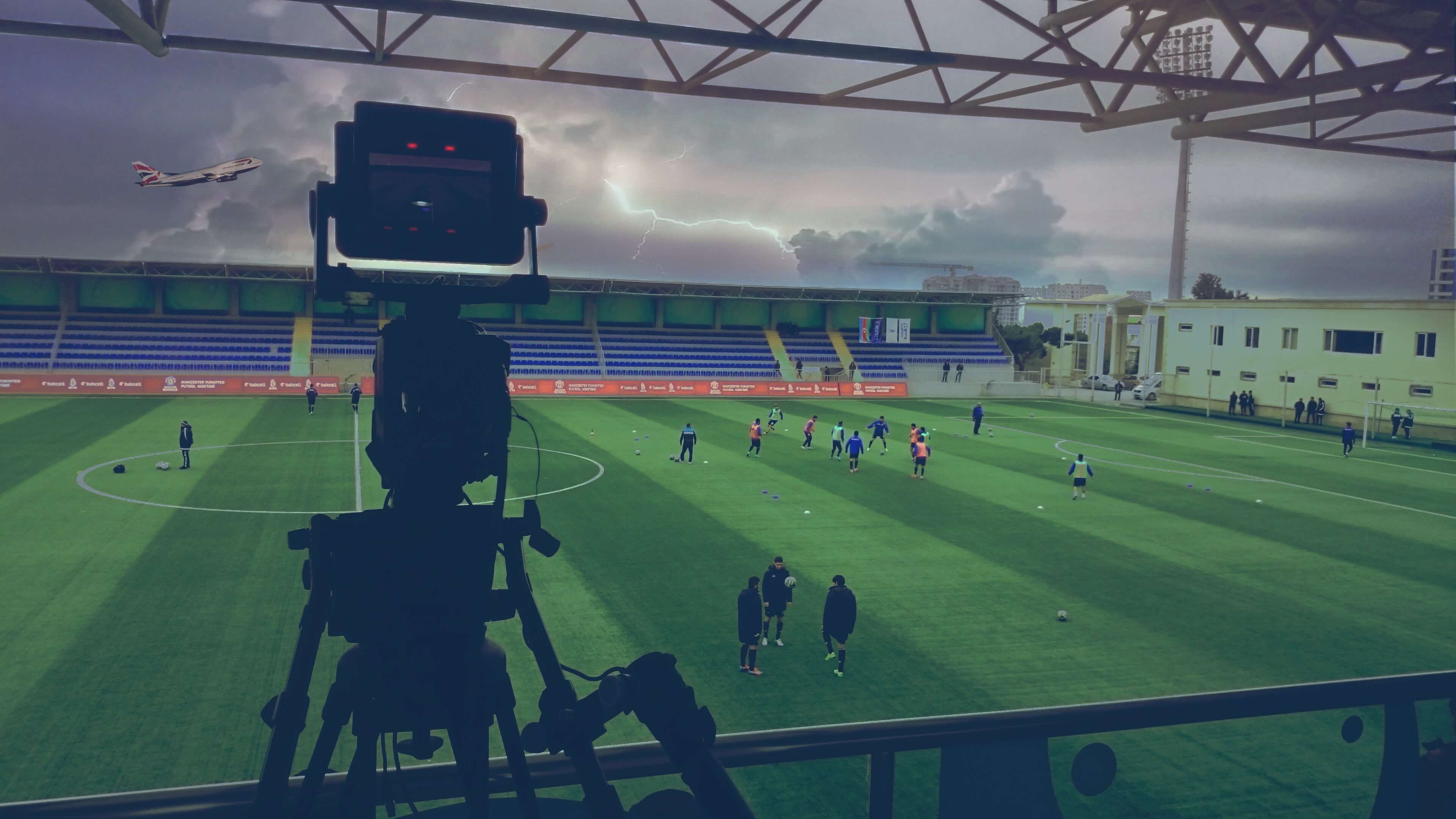 camera-filming-pro-football-training-football4football