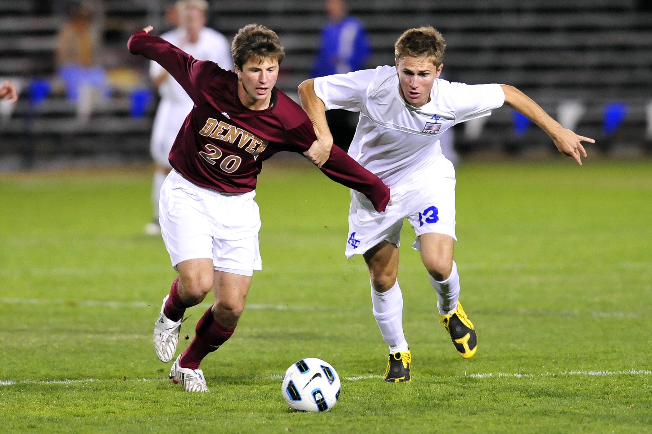 college-soccer-players-battle-for-the-ball-football4football