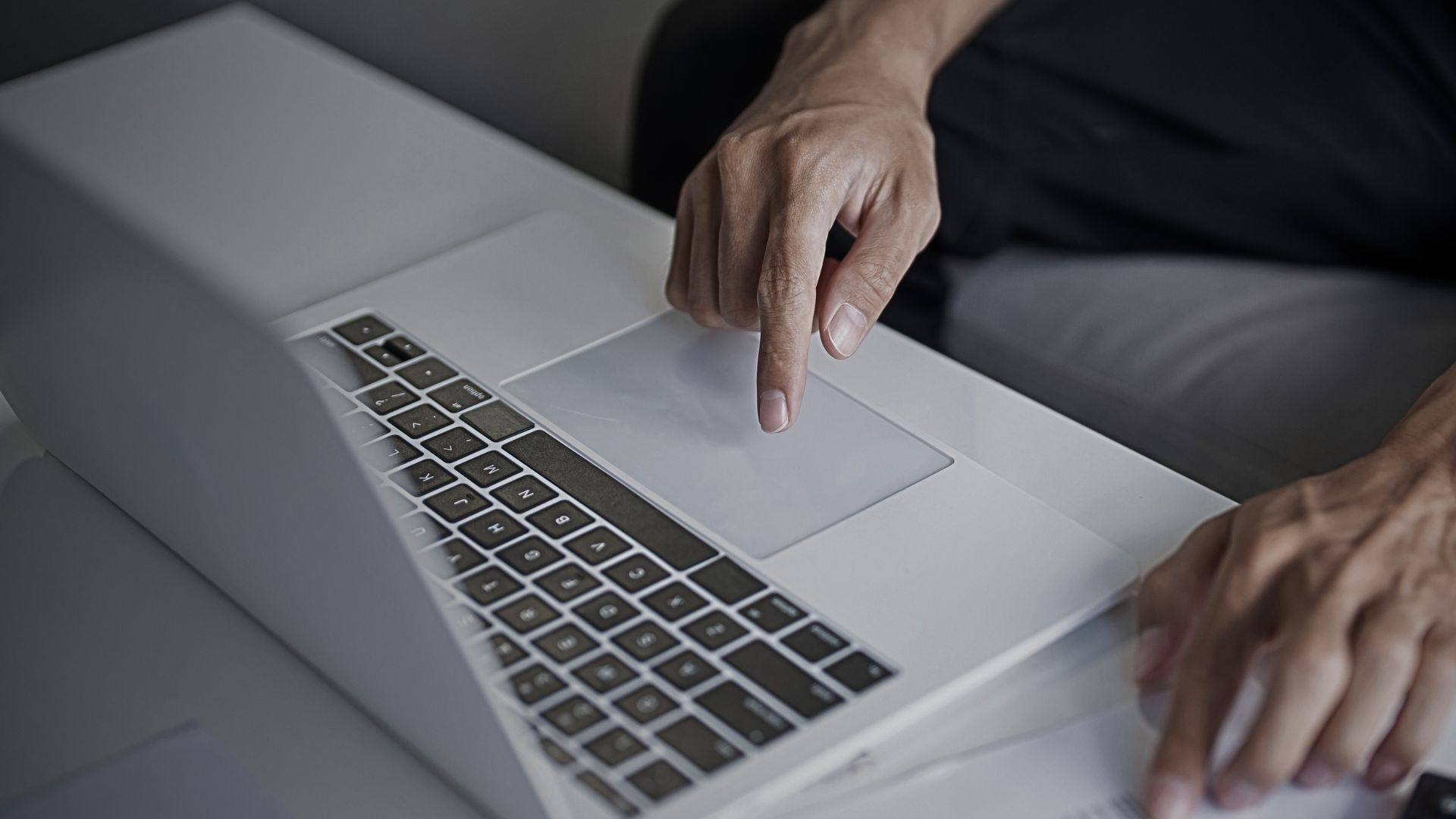 man-typing-on-a-laptop-football4football